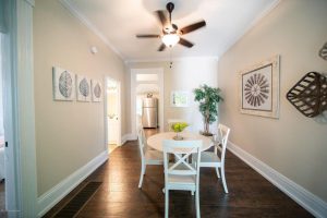 Louisville KY Home Staging, Louisville KY Interior Design, Louisville KY Renovation, Shotgun Home Stage, Sold in less than a month, light walls, stainless appliances, light linens, lighter colors make rooms look more spacious, hardwood flooring
