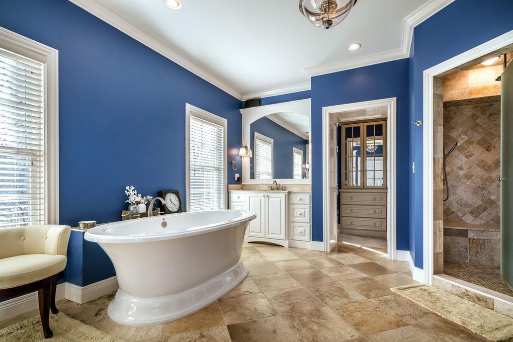 Louisville Interior Design, Louisville Home Staging, vanity lighting, soaking tub, master bathroom, ceramic tile flooring, blue bathroom, custom tile step in shower, white vanity