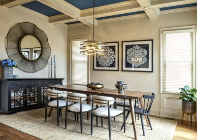 dining room, blue painted ceiling, contemporary lighting, midcentury dining table, fiddle leaf fig, black buffet, round mirror, round black metal chandelier, Arhaus Jagger dining armchair, natural fiber rug