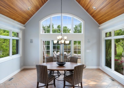 vaulted pine ceiling, arched picture window, luxury kitchen
